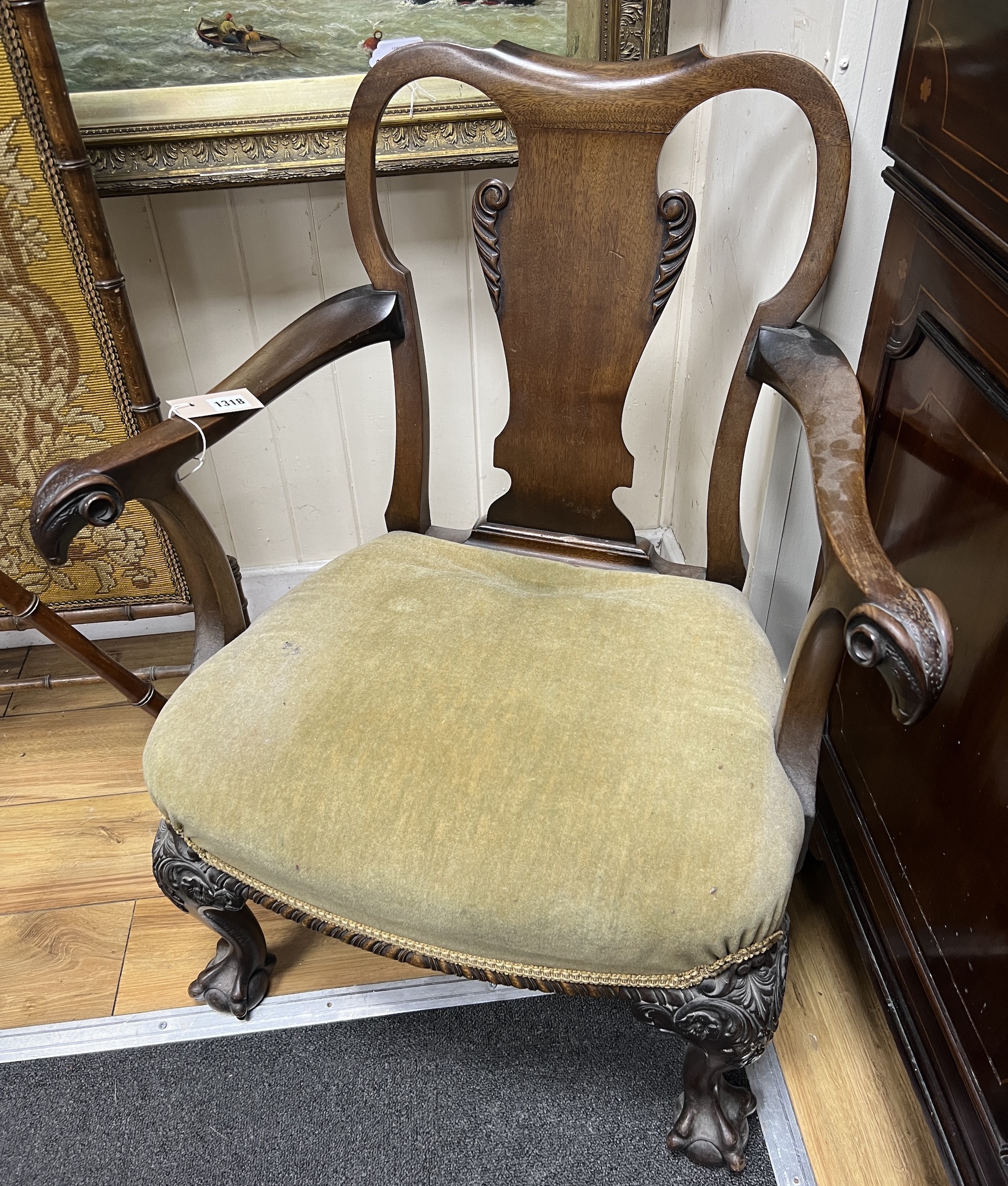 A small 18th century style mahogany open armchair with ram's head arms, width 64cm, height 80cm